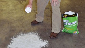 Use a product, such as Zep Instant Spill Absorber.
