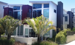 shipping container home Three Squared uses retired shipping containers as its primary framing material