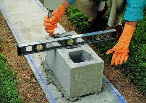 Furrow the mortar bed using the tip of the trowel