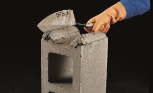 Press the block into the mortar bed