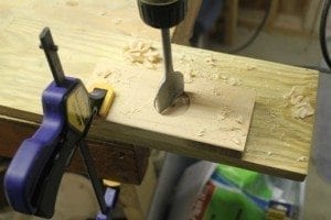 Start the hole by spinning the bit into the work piece