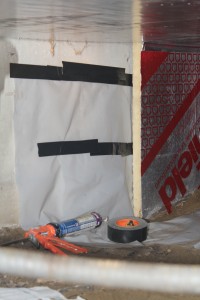 Vapor barrier system sealed with a continuous bead of polyurethane sealant.