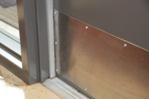 As each door is installed, open and close it a few times.